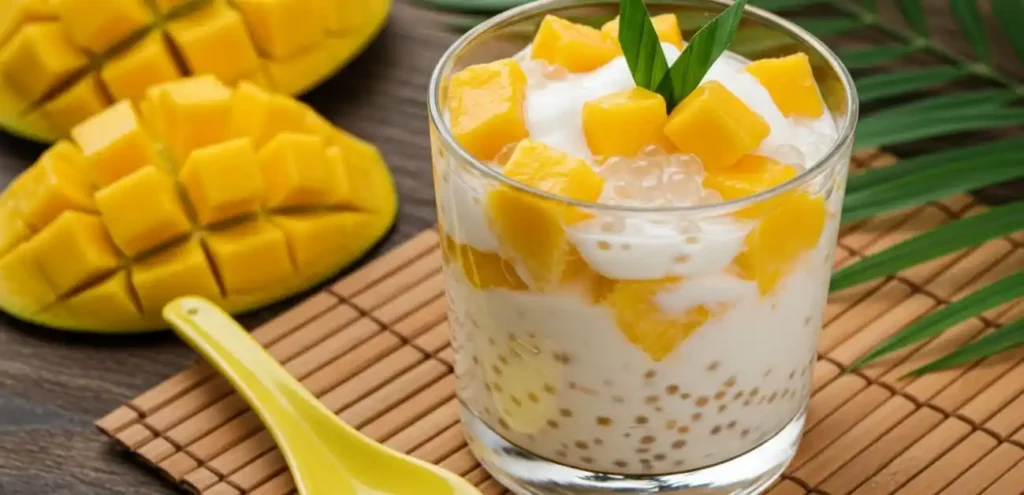 mango sago dessert with coconut and mango chunks